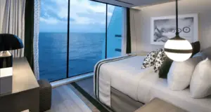 Slaapkamer van de Edge Villa op de Celebrity Ascent met kingsize bed