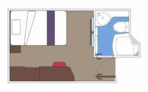 Interieur van een Studio Binnenhut IS op de World Atlantic, speciaal ontworpen voor solo-reizigers met een eenpersoonsbed en modern bureau.